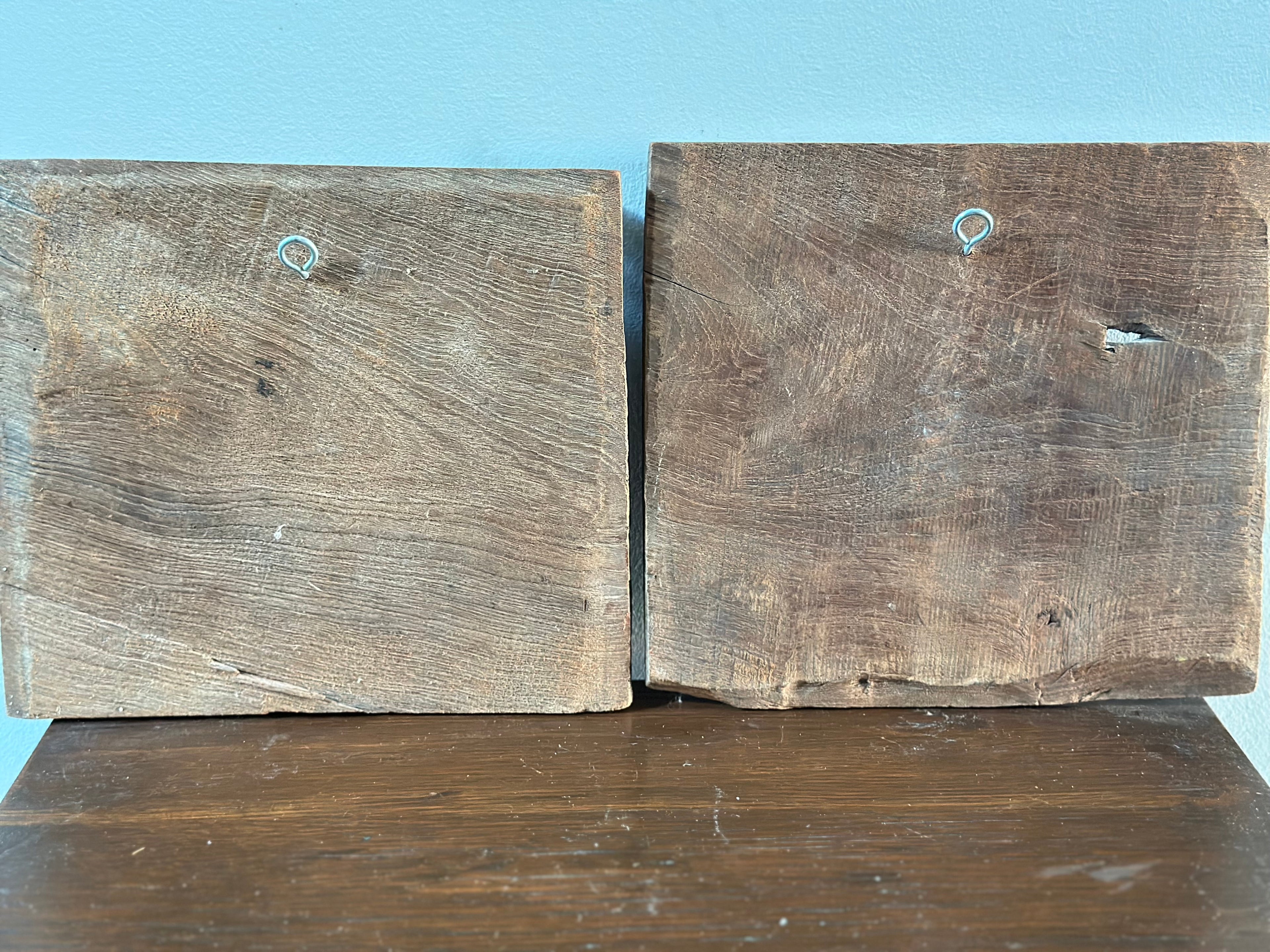 Two Hand Carved Wood Hangings