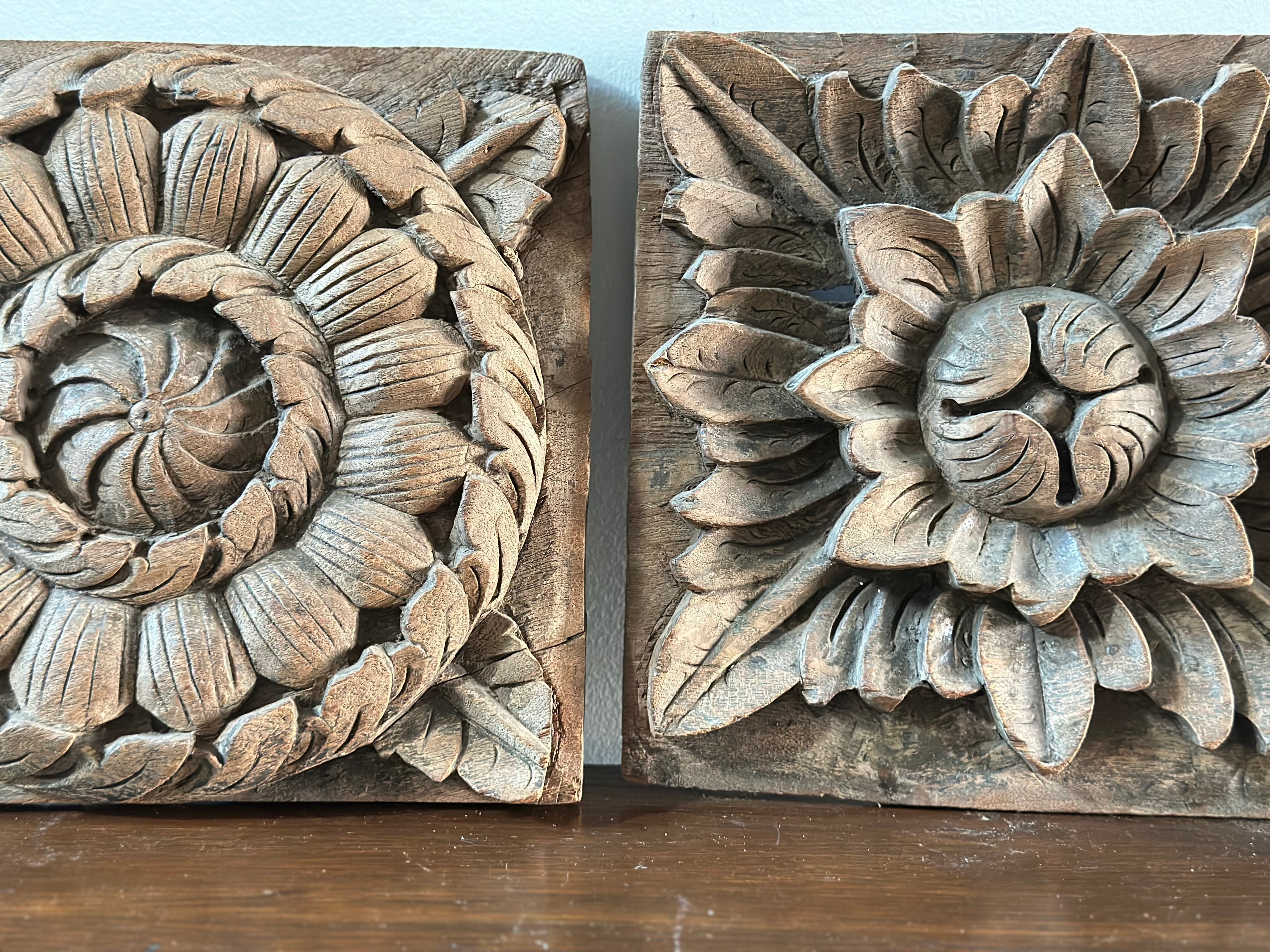 Two Hand Carved Wood Hangings